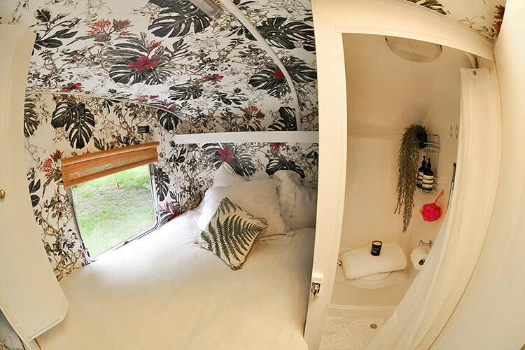 floral wallpaper in a vintage caravan interior